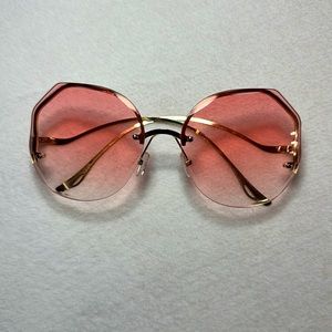 Retro Pink Rimless Sunglasses